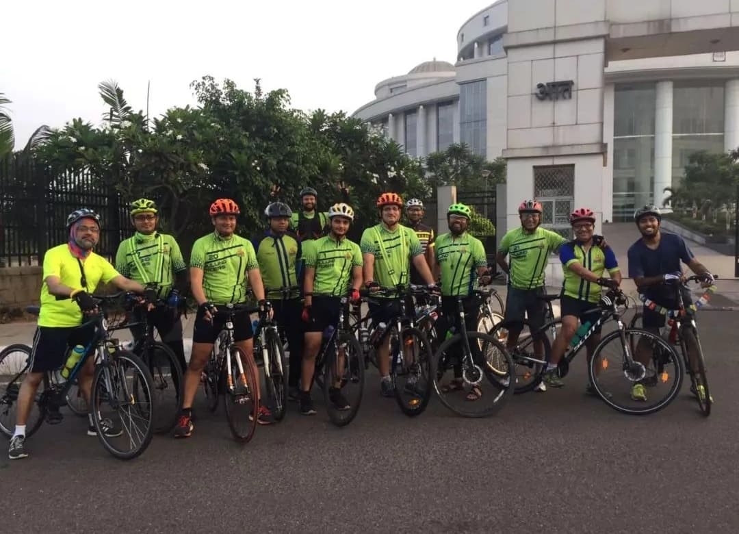 Group of cyclists riding together on an early morning road ride